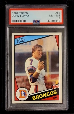 Fútbol americano Topps 1984 #63 John Elway radiocontrol novato PSA 8 HOF Denver Broncos Foto 1 de 2