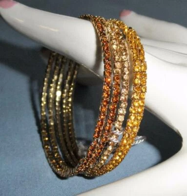 Brazalete de primavera Paula Abdul tono dorado y ámbar a oro 5 envolturas Foto 1 de 4