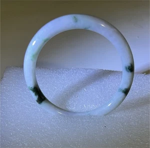 A Preowned Chinese jadeite bangle bracelet white with dark green spots rounded - Picture 1 of 8