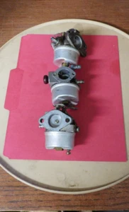 ASSORTED TECUMSEH ENGINE FLOAT BOWL CARBS - 3 TOTAL 2-CHOKE/1PRIMER -NON-WORKING - Picture 1 of 5