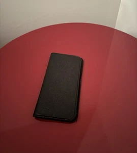 Coque iPhone Louis Vuitton Empreinte monogramme folio (iPhone X/XS) - Photo 1 sur 8