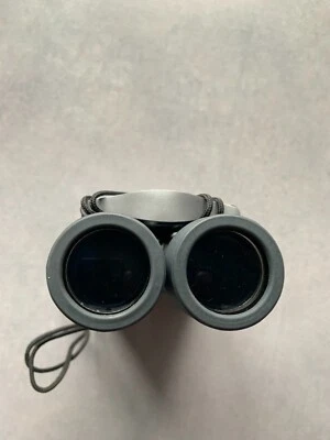 NIB Binolux 10x25 Roof Prism Binoculars with bag - Image 1 of 4