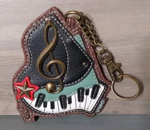 Llavero Muñequera Chala Paino Music 4x4.5 Texturizado Metal y Cuero - Imagen 1 de 3