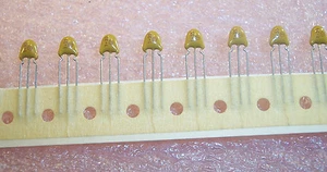 QTY (50) 1uf 35V 10% TRIPLE LEAD RADIAL DIPPED TANTALUM 299D105X9035AB6 SPRAGUE - Picture 1 of 1