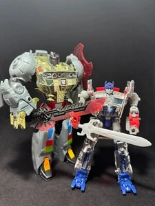 Transformers Age of Extinction Silver Knight Optimus Prime y Grimlock Completo - Imagen 1 de 7