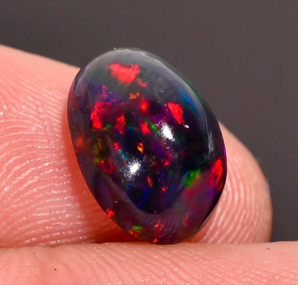Piedra preciosa suelta cabujón forma ovalada ópalo etíope negro natural 2,5 quilates 11x8x5 mm Foto 1 de 3