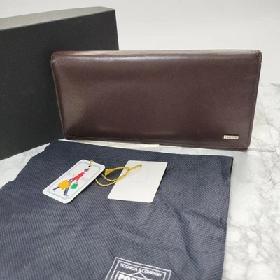 Cartera Larga de Cuero PORTER Marrón Diseño Elegante Usada Foto 1 de 4