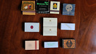 23 MATCHBOOKS AND MATCHBOXES.  11 INTERNATIONAL THEMED & 12 TRANSPORT THEMED