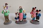 Lot de 3 figurines en porcelaine de Noël Dept 56 parcs Disney village famille