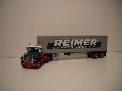 DCP FIRST GEAR 1/64 REIMER LOGOED FORD LT-9000 DAY CAB W/T 40' VINTAGE DRY VAN - Image 1 of 4