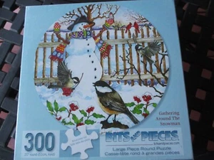 300 Piece Large Format 20" Round Art Puzzle "Gathering Around the Snowman" Bits - Picture 1 of 2