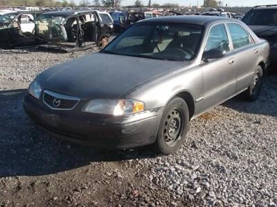 Cristal trasero usado se adapta a: Mazda 626 ES 2001 trasero grado A Foto 1 de 4