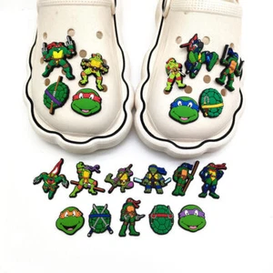 20 pezzi adolescenti mutanti tartarughe ninja ciondoli scarpe coccodrillo sandali cartoni animati decorazioni fai da te - Foto 1 di 9