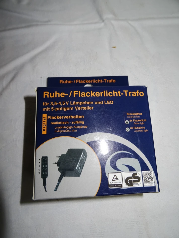 Ruhe-/Flackerlicht-Trafo für 3,5 V Lämpchen und LED,  2 x 5poliger Verteiler - Bild 1 von 1