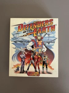 Jeu Defenders Of The Earth Commodore CBM 64 C64 128 C128 Disk Elite - Zdjęcie 1 z 10