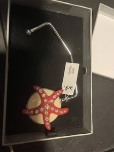 Porta borsetta stella marina - Foto 1 di 1