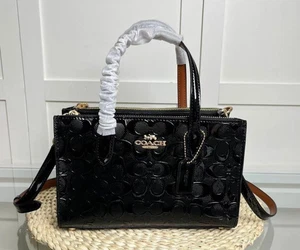 CV400 Coach Nina kleine schwarze Beuteltasche Tasche charakteristisches Leder Outlet-Produkte neu mit Etikett - Bild 1 von 8