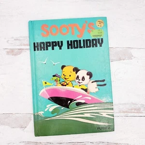 1981 Purnell Sooty's Happy Holiday Children's Book Hardcover - Foto 1 di 9