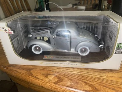 NEW SIGNATURE MODELS 1936 PONTIAC DELUXE 1:18 DIE CAST CAR - Image 1 of 4
