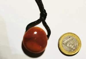 Karneol Trommelstein gebohrt am Band Nr. 237 - Bild 1 von 1