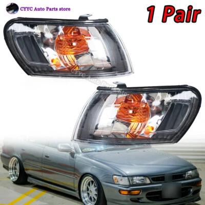 Par de lentes de lámpara de esquina delantera negra para Toyota Corolla AE100 E100 AE101 1993-1997 Foto 1 de 4