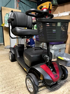 mobility scooter used. Dark red colour and hardly used. - Picture 1 of 8