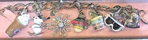 JUICY COUTURE SKIING CHARM BRACELET W/ 6 REMOVABLE CHARMS - Picture 1 of 6