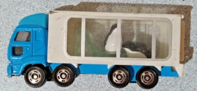 Suelto Tomica Nissan Diesel Pulgar Grande Animal Transporte Pingüino Foto 1 de 4