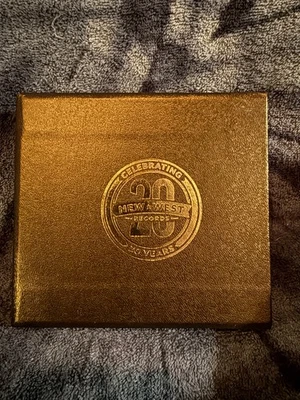 New West Records - 20th Anniversary Box Set, 3Cd + Book, Like New - Image 1 of 3