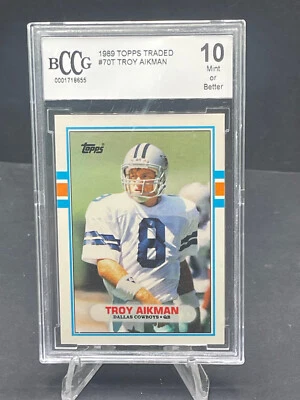 1989 TROY AIKMAN TOPPS TRADED ROOKIE CARD #70T BCCG 10 GEM MINT OR BETTER RC HOF - Image 1 of 2