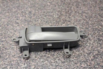 Nissan Sentra 2010 brazo de palanca de manija lateral de la puerta del conductor trasero izquierdo LH L 10 Foto 1 de 4