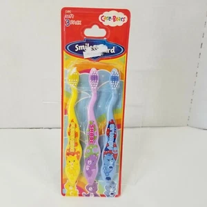 Paquete de 3 cepillos de dientes suaves Care Bear Kids Funshine Share gruñón nuevos - Imagen 1 de 7