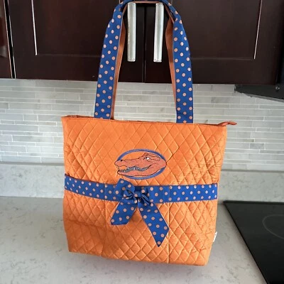 BOLSO DE MANO ACOLCHADO AZUL NARANJA BELVAH UF University of FLORIDA CATORS Foto 1 de 4