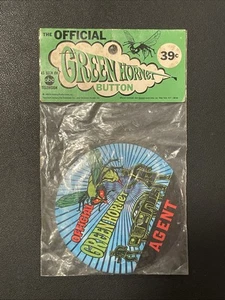 Grüner Hornissenknopf von 1966 in Originalverpackung versiegelt - Bild 1 von 2
