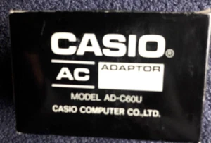 GENUINE CASIO AC ADAPTOR, AD-C60U, INPUT AC120V,NEW, ORIGINAL PACK - Picture 1 of 2