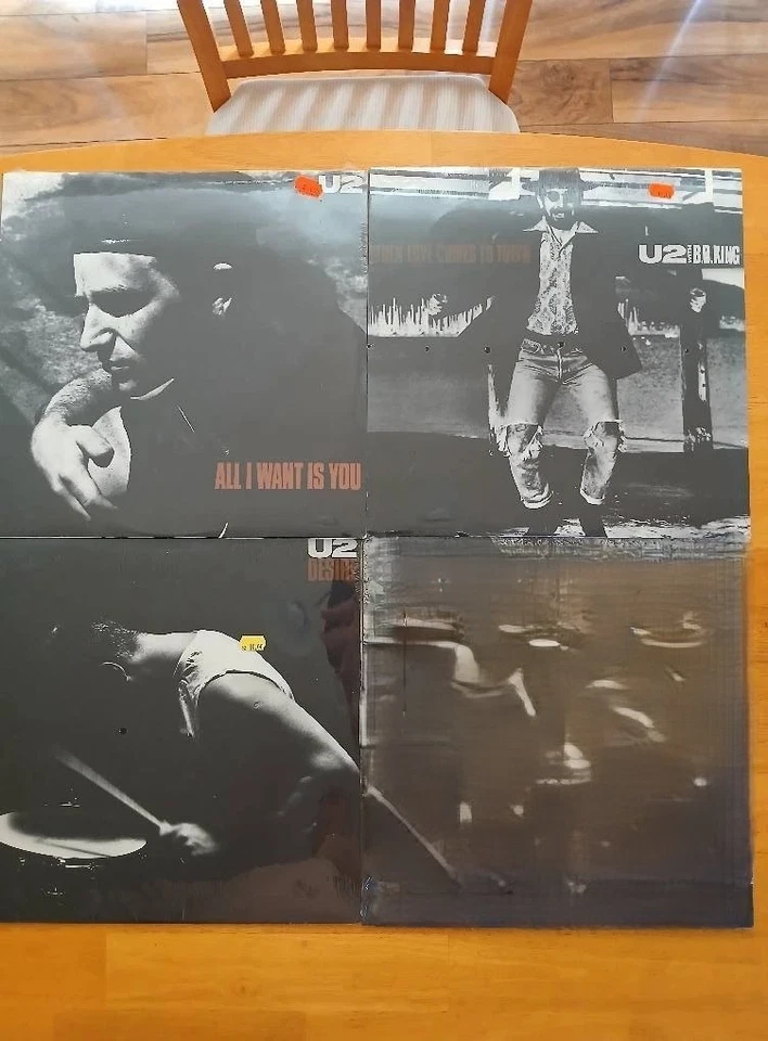 U2 Lot of 3 Vinyl 12 inch singles, still new sealed - Image 1 of 1