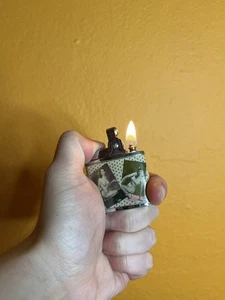 Vintage Omega Brand Pinup Nude Photos Lighter - Picture 1 of 4