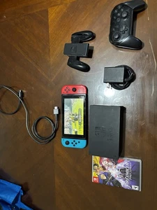 Nintendo Switch 32GB Handheld Console - Neon Red/Neon Blue - Picture 1 of 2