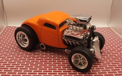 Muscle Machines  1/18 1933 Ford Coupe Diecast Orange With  Box - Image 1 of 4
