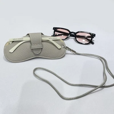 Estuche protector para gafas con correa ajustable para el cuello para almacenamiento de gafas Foto 1 de 4