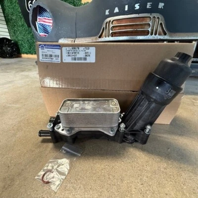 (1) genuine Oem Mopar Oil Cooler 2014-23 3.6L 68596317AB same as dealership new - Image 1 of 4