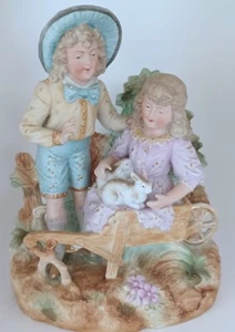 Antique German Large Figural Bisque of a Young Couple Holding Bunnies Rabbits - Picture 1 of 10