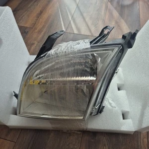 HELLA GENUINE OEM 1LD246044-231 LEFT HEADLIGHT FORD FUSION '02- BROKEN BRACKET - Picture 1 of 7