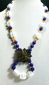 Vintage DELILLO Long Necklace W/Large Blue/White Beads/Metal Pendant Signed - Foto 1 di 7