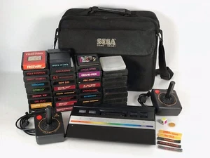 Atari 2600 w/ 34 Games, 2 Controllers, and Bag - Picture 1 of 12