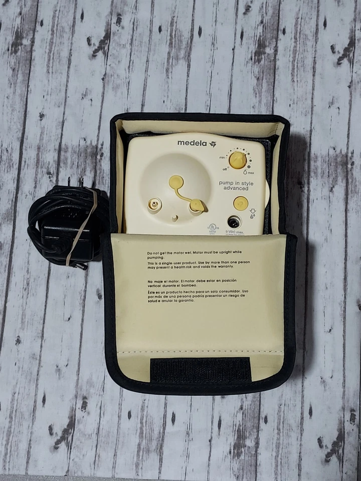 Extractor de leche doble avanzado con estilo Medela con cable de alimentación de CA Foto 1 de 1