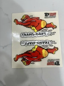 TRANS-DAPT THE SAAPE 2PC SET RACING DECAL / STICKER - Picture 1 of 1