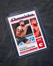 2023 PANINI - CHRONICLES - UFC - BLUE PRIZM - RAPHAEL ASSUNCAO - 25/99 - RC