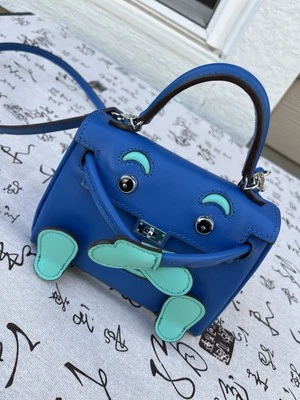 mini bolso de mano G2U Foto 1 de 4