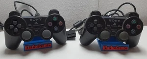 2 x manettes originales PS2 noires DualShock 2 Sony PlayStation SCPH-10010 C7070 - Photo 1/1